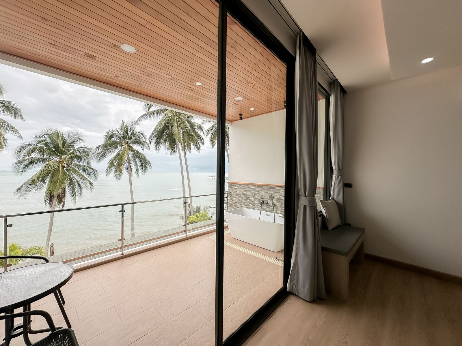 Balcony with sea and palm views